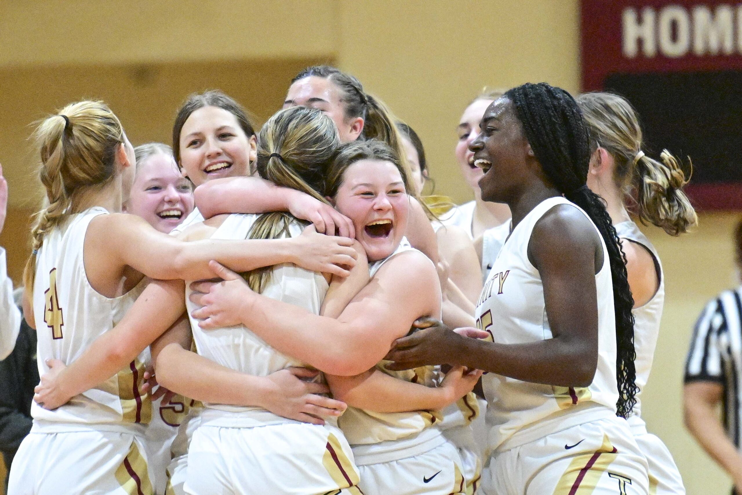 Barnett reaches 1,000 career points as Trinity wins season-opener 73-50